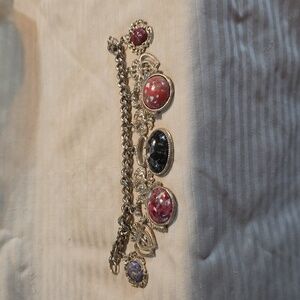 Elegant Gold and Red Charm Bracelet